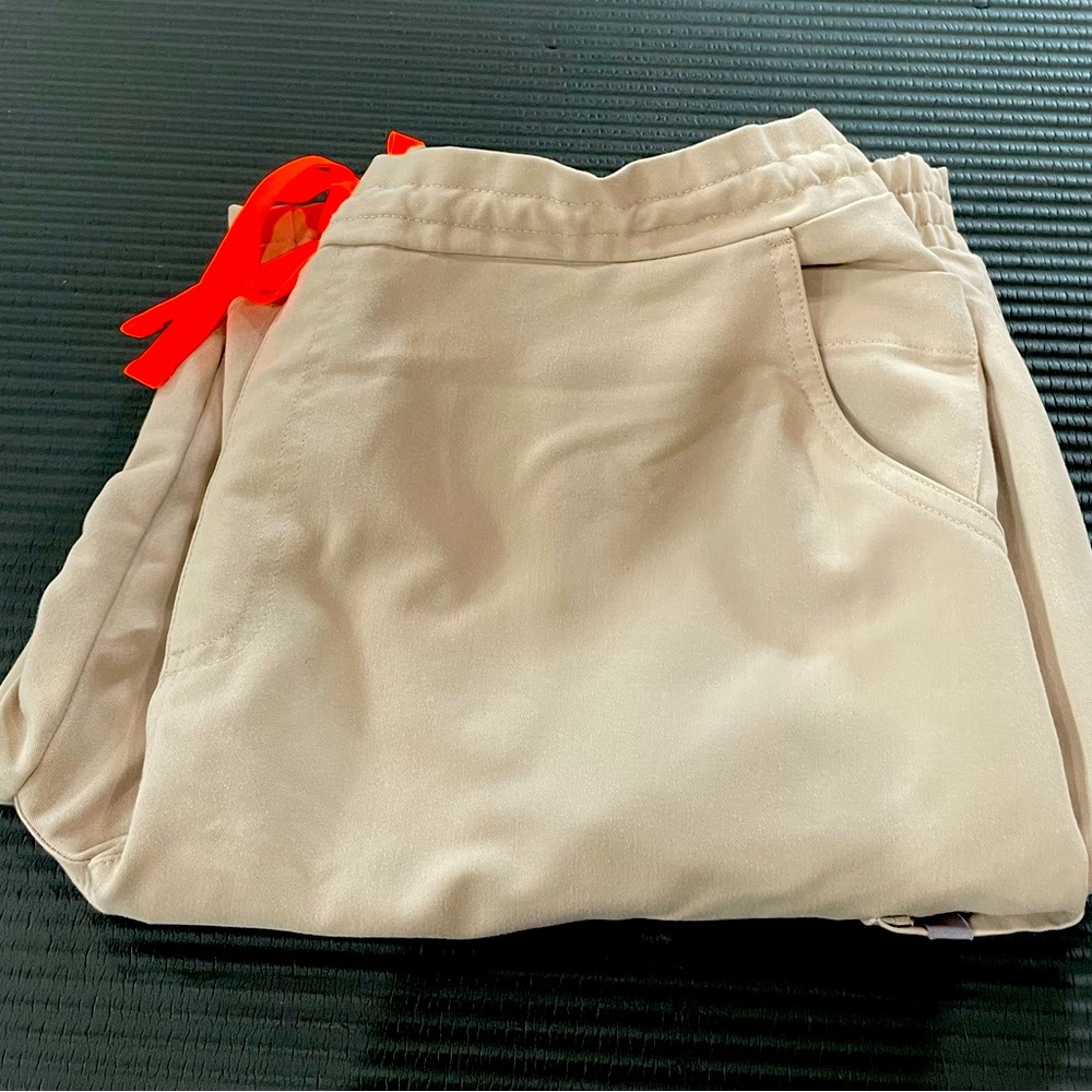 Figs, Yola pants. Color: Tan - Size Large